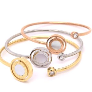 Armband med vändbar platta